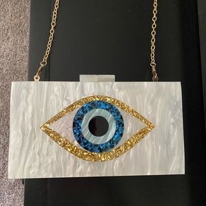 Evil eye clutch brand new , never used!